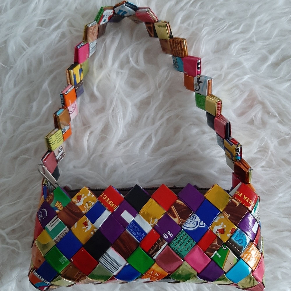 Mini purse made from gum wrappers.